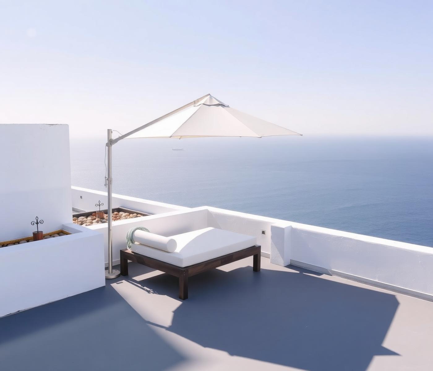 Private rooftop terrace with daybed and parasol above the sea